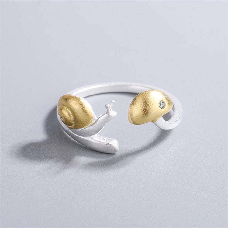 Golden snail with the mushroom ring - Style's Bug
