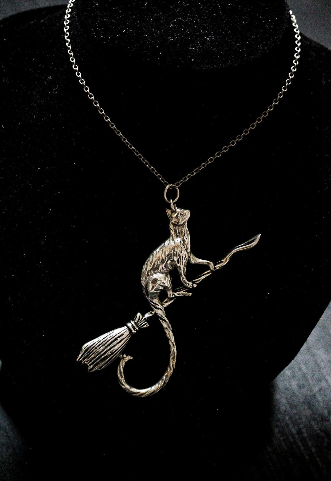 The Cat on a Broomstick necklace - Style's Bug